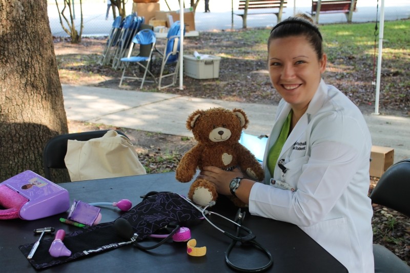 Mercer medical students diagnose stuffed animal ailments at the Forsyth Farmers Market while their human counterparts receive free health screenings.