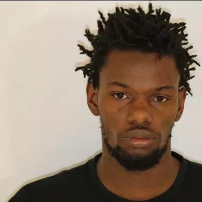 Image: One charged, 2 sought in home invasion