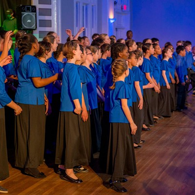 Roger Moss, Savannah Children's Choir lead the Lighted Christmas Parade