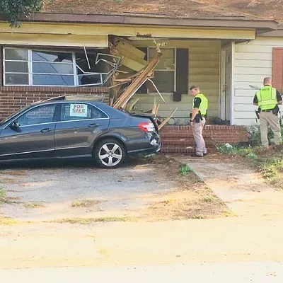 Image: Car hits house on DeRenne