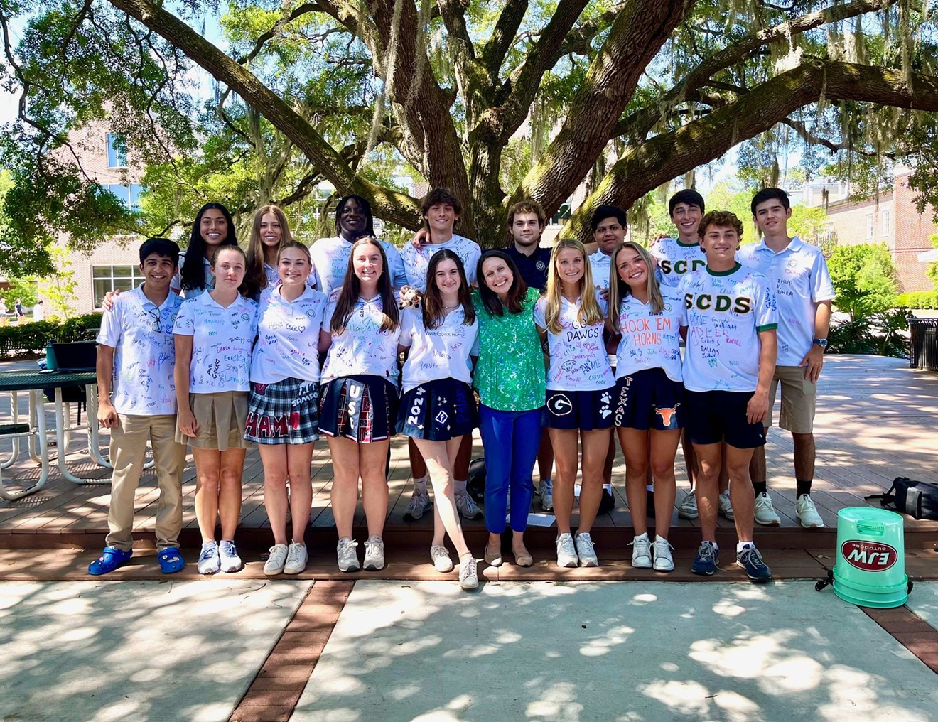 Mrs. Jacqueline Smith (front row, middle) with her Savannah Country Day School AP Literature students. Ella Stone, standing next to the right of Mrs. Smith, says of her teacher, "she always found a way to make lessons fun."