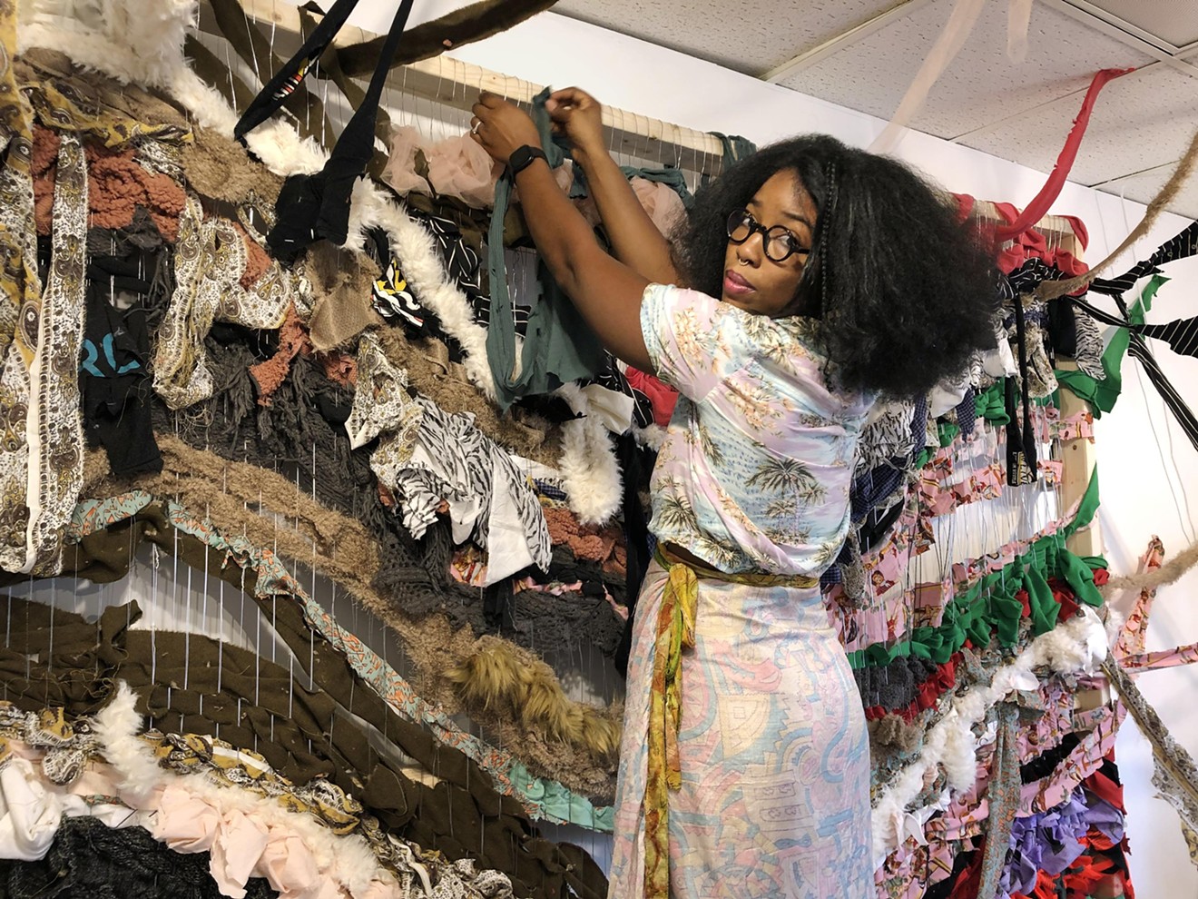 The artist during her 2022 ON::View Residency at Arts Southeast when she invited fellow Savannahians to share memories and bring in "meaningful scraps" of fabric