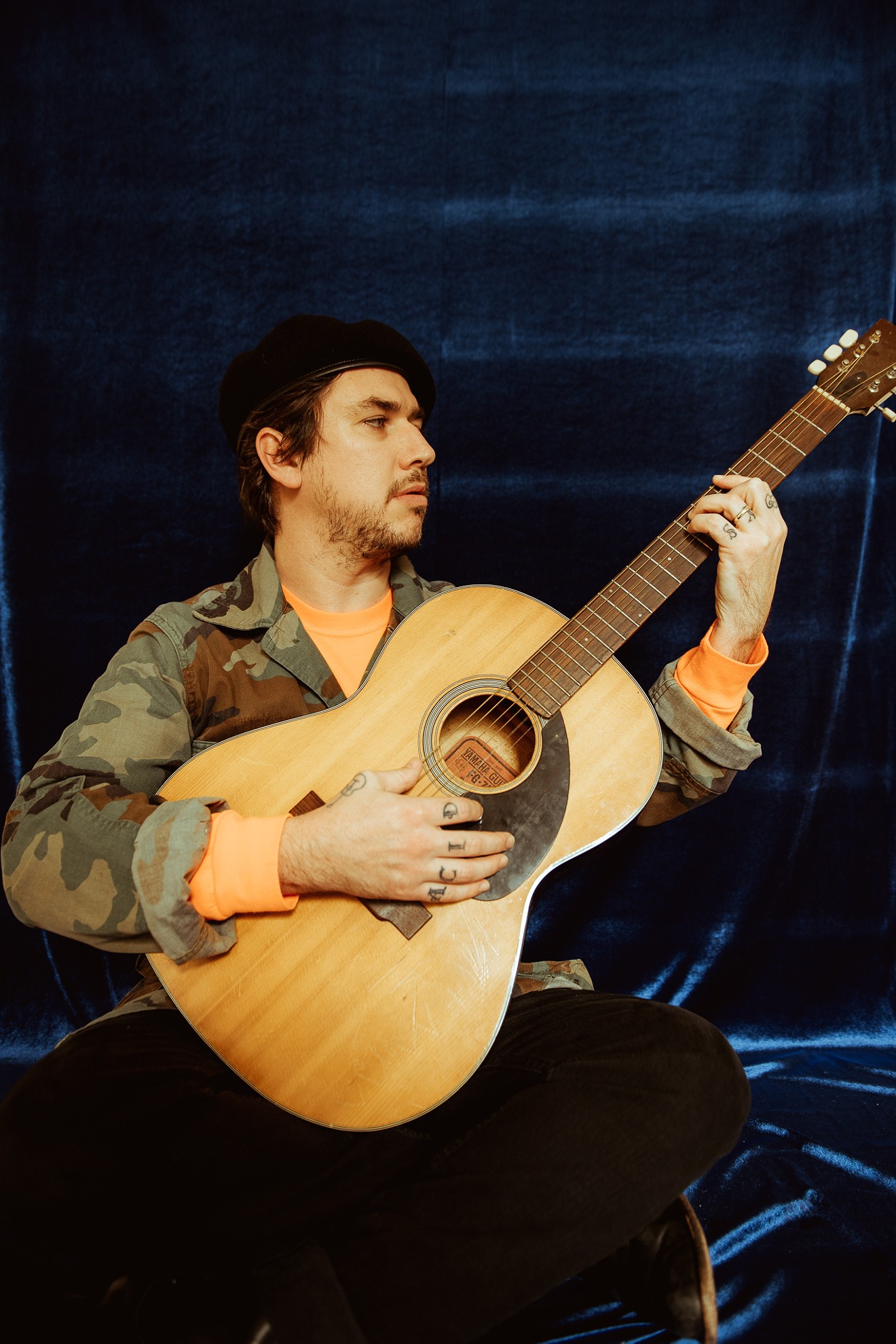 Justin Rogue performs acoustically as a member of SUSTO at a previous show. The singer-songwriter will take the stage at Service Brewing Company this summer to play a solo show.