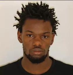 One charged, 2 sought in home invasion