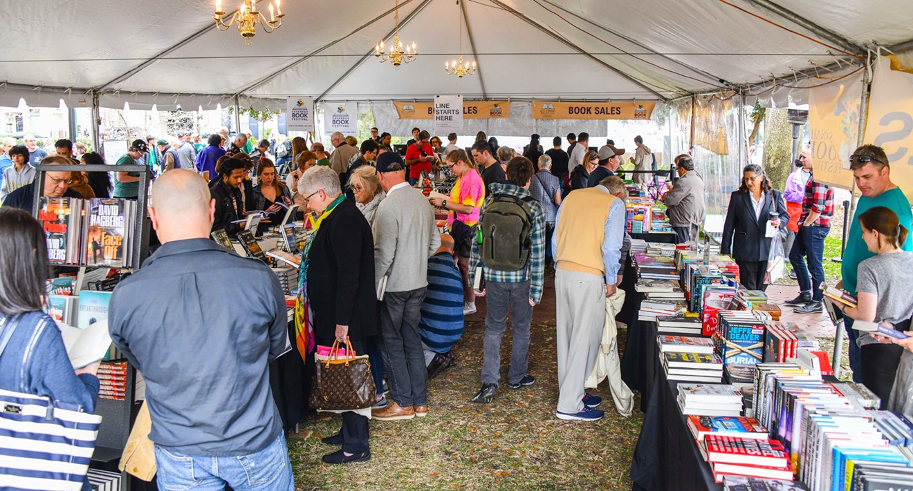 Attendees navigate the tables of books at the 2019 Savannah Book Festival.