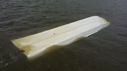 Stolen boat found capsized in Savannah River