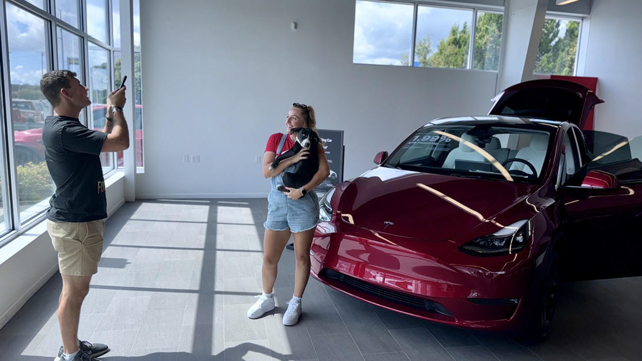 Tesla Hosts Renegade Paws Dog Adoption Event