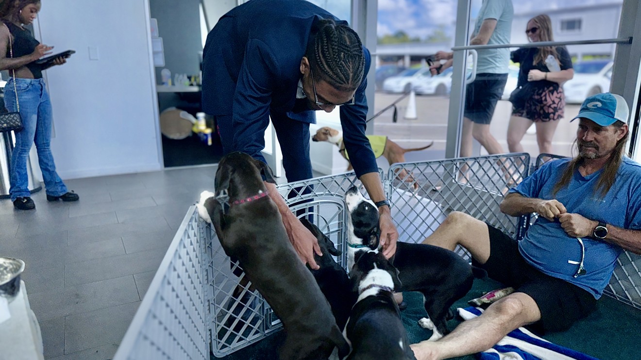 Tesla Hosts Renegade Paws Dog Adoption Event