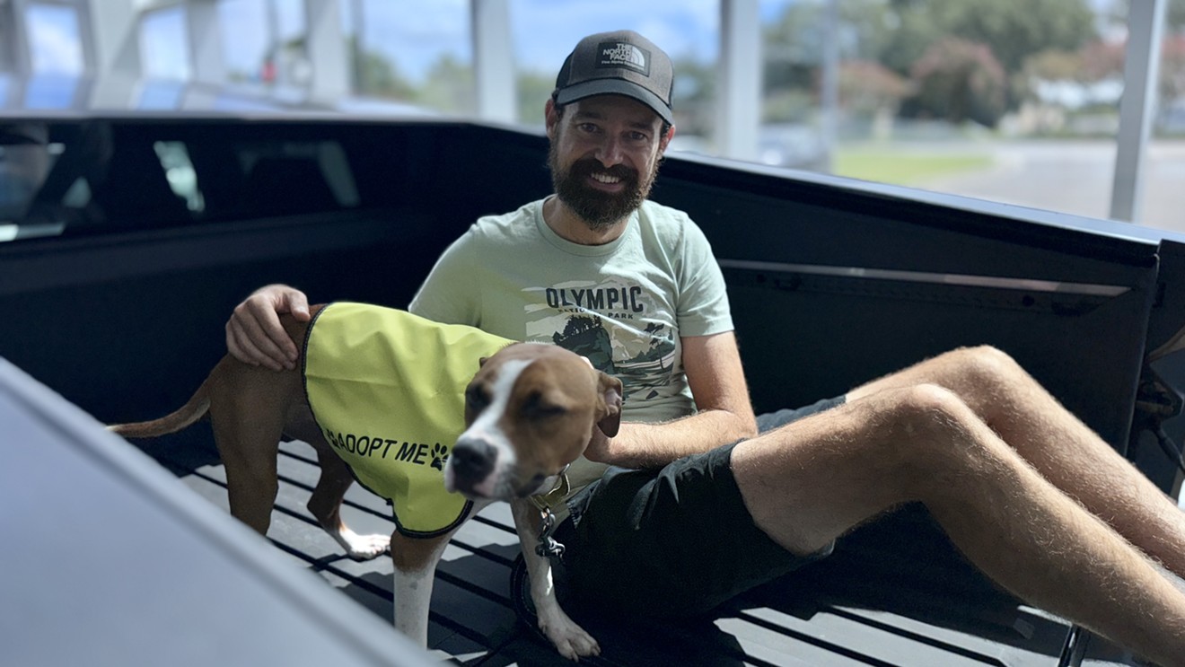 Tesla Hosts Renegade Paws Dog Adoption Event